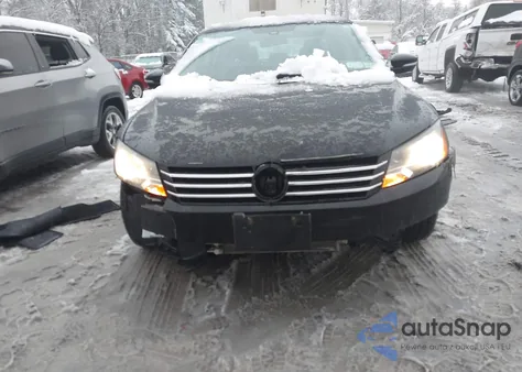 2015 Volkswagen Passat 1.8T Wolfsburg Edition z USA, uszkodzony, nr VIN 1VWAT7A3XFC069568